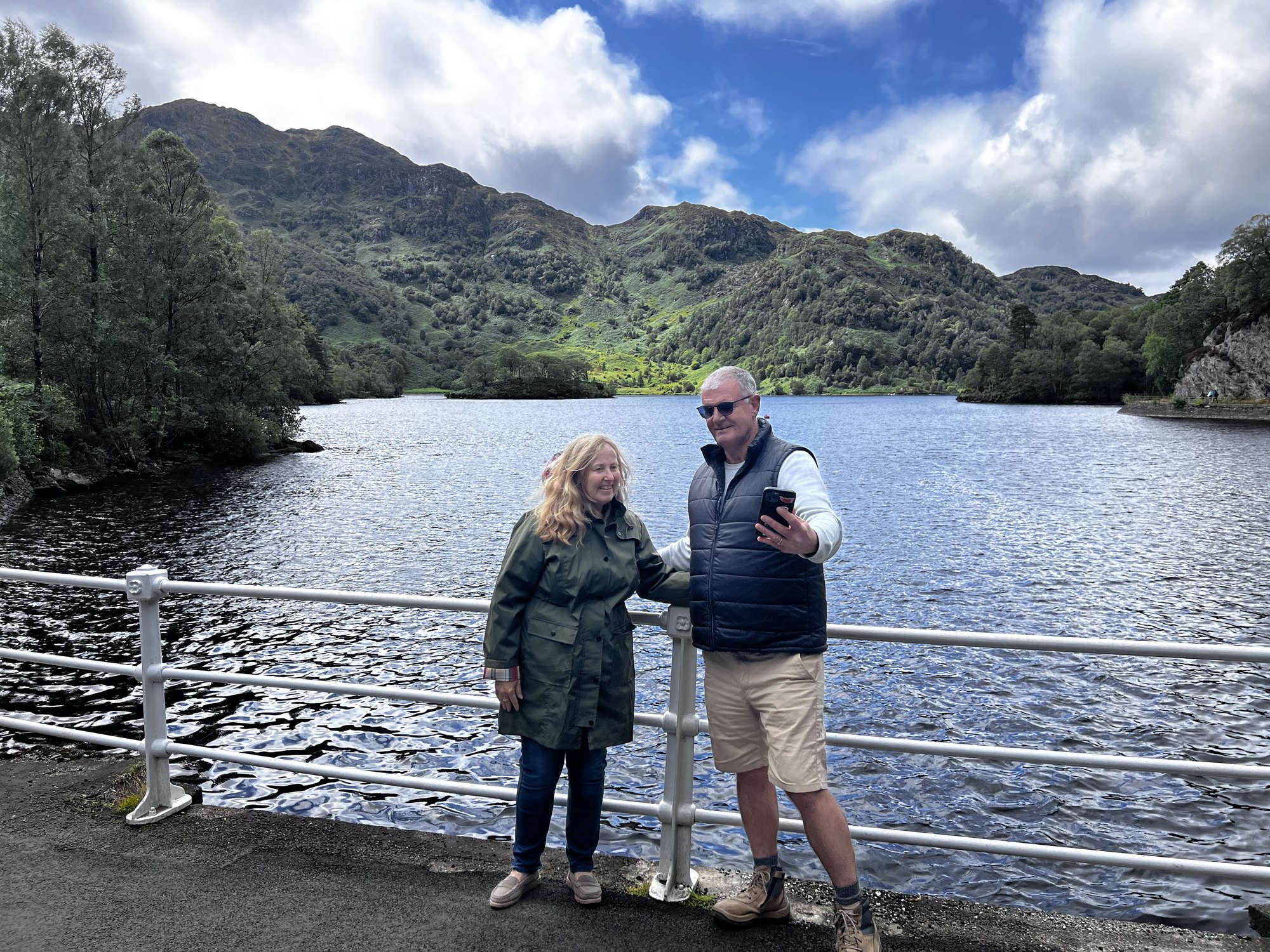 Lyn and Steve beside a Scottish loch