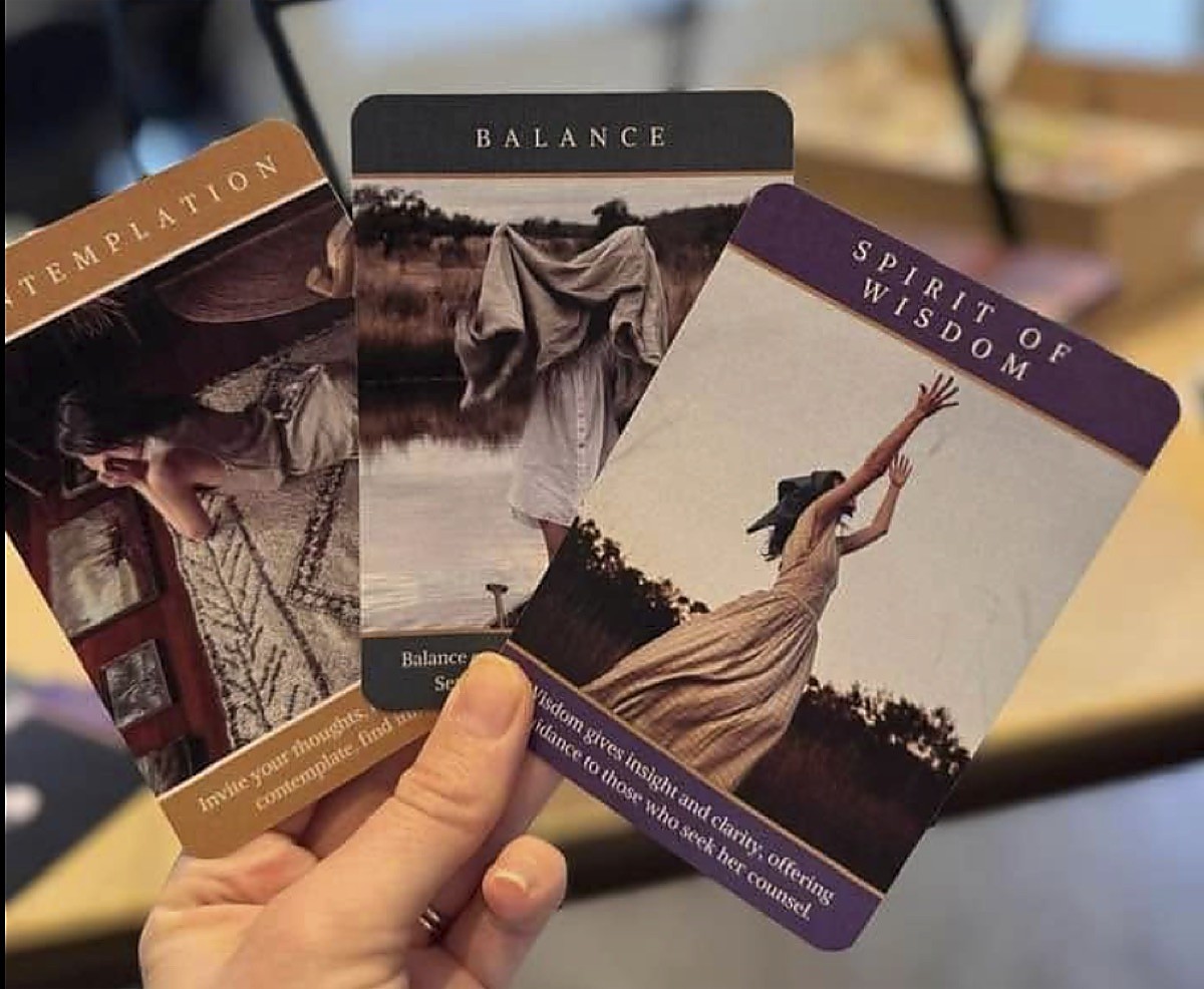 Serenity Unveiled cards in hand: Contemplation, Balance and Spirit of Wisdom
