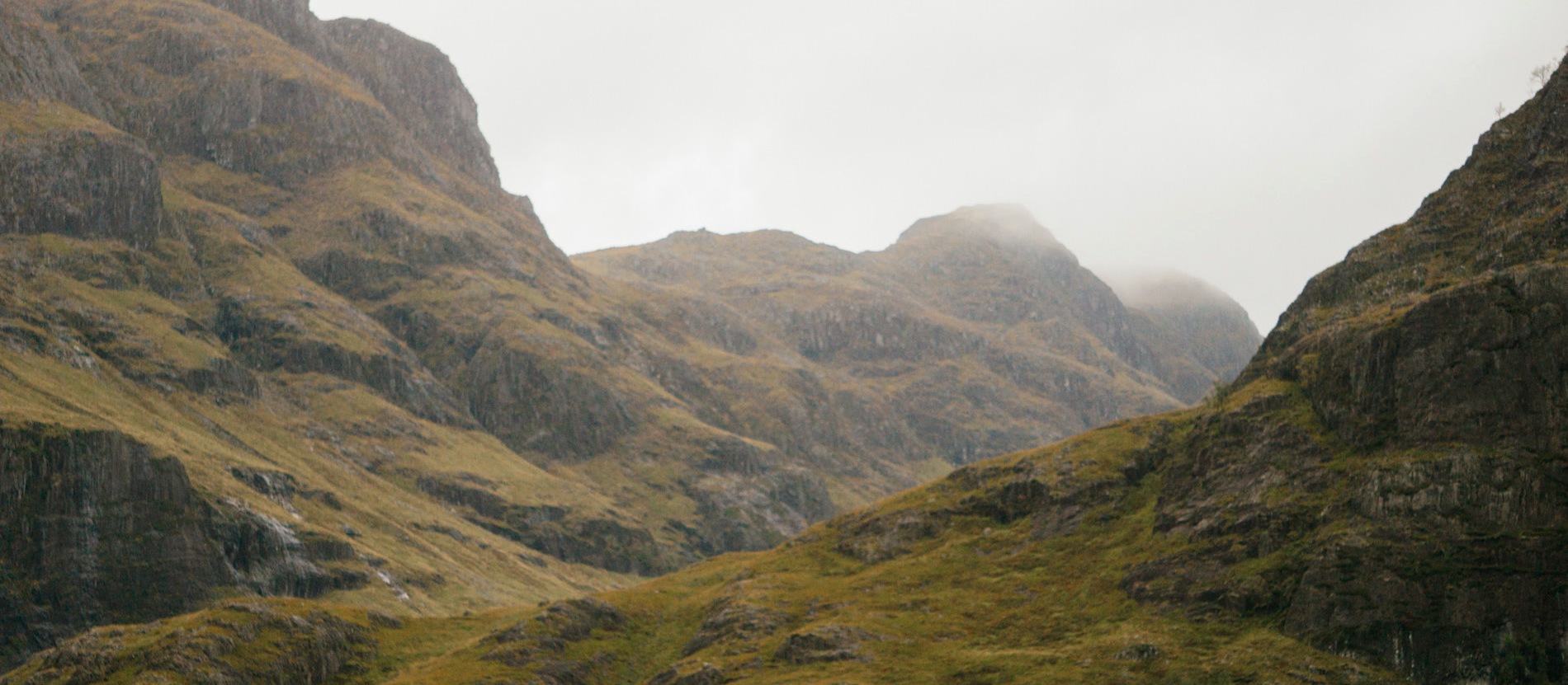 The mountains of Glencoe, mist along the valley