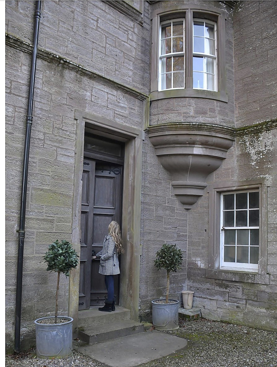 Lyn at the doorway of Kinnaird Castle